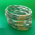 Stackable set of 9 clear jelly bangles with striped inserts and gold accents - 9 Pieces Set / Striped Black