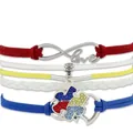 Detail of Autism awareness multi-layer woven bracelet with puzzle and love charms - Multi-layer Woven Heart Puzzle Bracelet / Red