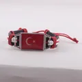 Handmade braided leather bracelet featuring Turkey flag charm with red and black wax cord - Turkey