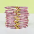 Set di 10 braccialetti jelly glitterati rosa con ciondoli a loto dorati - Confezione da 10 / Rosa coreano