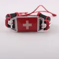 Handmade braided leather bracelet featuring a vibrant red Switzerland flag charm - Swiss