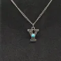 Close-up of vintage silver necklace with letter Y pendant and turquoise - Letter Y