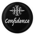 Detailed view of a 12mm Noosa snap button with Confidence script and silver flourish - Suede Brown