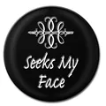 Close-up of black Noosa snap button with Seeks My Face text - 18mm / Titanium White