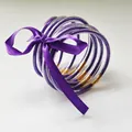 Set of nine purple glitter jelly bangles with gold foil accents and purple ribbon tie - 9 Pieces Set / Purple