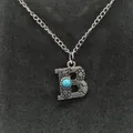 Vintage silver-tone letter B pendant necklace featuring turquoise bead and sunflower motifs - Letter B