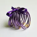 Set of 10 purple glitter jelly bangles with matching ribbon bow, PVC tube style. - 10 Pieces Pack / Purple