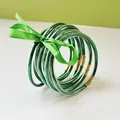 Elegant set of 9 green glitter jelly bangles crafted from flexible PVC tube material - 9 Pieces Set / Green