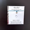 Handmade blue cord wish bracelet featuring apple charm and teacher appreciation card - Sky Blue