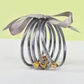 Set of 5 silver glitter silicone jelly bangles with golden lotus clasps and ribbon - 5 Pieces / Dark Gray