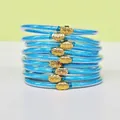 Lot de 9 bracelets en silicone pailleté bleu avec boucles lotus dorées pour femmes. - Bleu ciel
