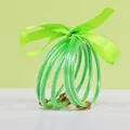 Set of 5 neon green silicone glitter bangles tied with a matching elegant ribbon bow - 5 Pieces / Verdant