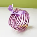 Set of nine purple glitter jelly bangles made of PVC with a decorative ribbon bow - 9 Pieces Set / Light Purple