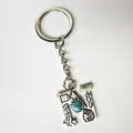 Vintage silver stainless steel keychain featuring letter N with turquoise stone inlay - Letter N