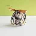 Set of 9 leopard print PVC jelly bangles with gold glitter accents and bronze ribbon. - 9 Pieces Set / Leopard Print