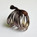 Elegante set van 10 met glitter gevulde PVC jelly armbanden met bruin zijden lint - koffiekleur