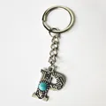 Vintage silver initial letter P keychain with engraved patterns and turquoise stone inlay - Letter P