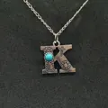 Vintage silver initial K pendant necklace with turquoise bead and floral engraving - Letter K