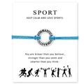 Detailed view of blue braided gymnastics bracelet on a motivational sports gift card. - Blue