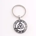 Viking Norse mythology glass dome keychain with black and white Celtic knot design - Triquetra / Silver