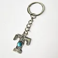Vintage silver stainless steel letter T keychain featuring an engraved turquoise stone detail - Letter T