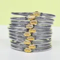 Braccialetti jelly glitterati argento con chiusura a loto dorata in silicone PVC - Confezione da 10 / Grigio scuro