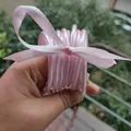 Een set van 10 roze glitter jelly armbanden van flexibel PVC siliconen materiaal - Lichtroze
