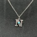 Vintage silver initial N necklace with stamped ethnic patterns and turquoise stone - Letter N