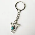 Vintage silver stainless steel letter V keychain with turquoise bead and bull engraving - Letter V