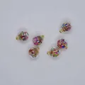 Detailed view of 16mm clear glass ball charms filled with colorful rhinestones for DIY - Multicolor