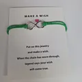 Infinity charm bracelet on green cord with Make a Wish gift card - Infinity Symbol (EB0168) / Green