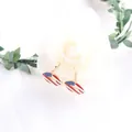 Patriotic US flag lip-shaped enamel dangle earrings for Independence Day celebration - Mouth Shape