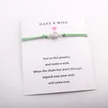 Handmade green cord make a wish card bracelet featuring a cute silver sea turtle charm pendant - Green