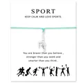 Détail du bracelet avec pendentif de gymnaste sur une carte de vœux de sport - Anneaux de Gymnastique Sarcelle