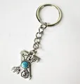 Vintage silver stainless steel letter X keychain with turquoise and Indian motifs - Letter X
