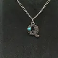 Vintage style silver chain necklace featuring a turquoise inlaid letter Q pendant - Letter Q