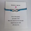 Blue infinity symbol wish card bracelet for women, adjustable handmade string jewelry - Infinity Symbol (EB0168) / Light Blue