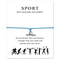 Gros plan d'un bracelet de gymnastique bleu avec breloque I heart gymnastics sur carte - Bleu foncé