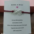 Wine red cord infinity symbol bracelet with 'Make a Wish' display card - Infinity Symbol (EB0168) / Burgundy