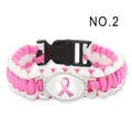 Detailed view of handmade pink ribbon paracord bracelet with white braided cord and buckle - Pink Ribbon / Pink & White Woven