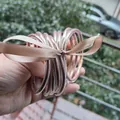 Set van 10 glinsterende roségouden glitter jelly armbanden met een champagne lint strik - Nieuw Roségoud