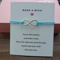 Infinity charm wish card bracelet with adjustable cyan braided cord for women's jewelry gift - Infinity Symbol (EB0168) / Sky Blue