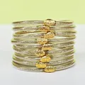Élégant ensemble de 9 bracelets en silicone souple avec paillettes dorées et boucle lotus - Pack de 9 Pièces / Or clair