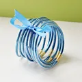 Set of nine blue glitter-filled silicone tube jelly bangles tied with a decorative ribbon - 9 Pieces Set / Lake Blue