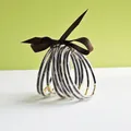 Fashionable set of 9 leopard print PVC jelly bangles with gold connectors and brown ribbon - 9 Pieces Set / Coffee Leopard