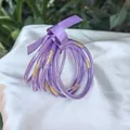 Elegant set of 9 purple glitter jelly bangles with golden foil accents and ribbon - 9 Pieces Set / Phantom Purple