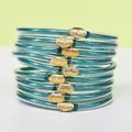 Ensemble de 9 bracelets empilables en silicone à paillettes avec breloques lotus dorées - Pack de 9 Pièces / Vert paon