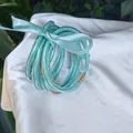 Shimmering teal blue glitter jelly bangles set of 9 pieces tied with a satin ribbon. - 9 Pieces Set / Turquoise Blue