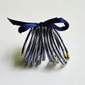 Set van 10 donkerblauwe glitter jelly armbanden met een bijpassende donkerblauwe strik - Marineblauw