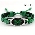 Pulsera tejida de cuero verde y negro hecha a mano con dije de cinta de mariposa - Mariposa Verde (NO.11)